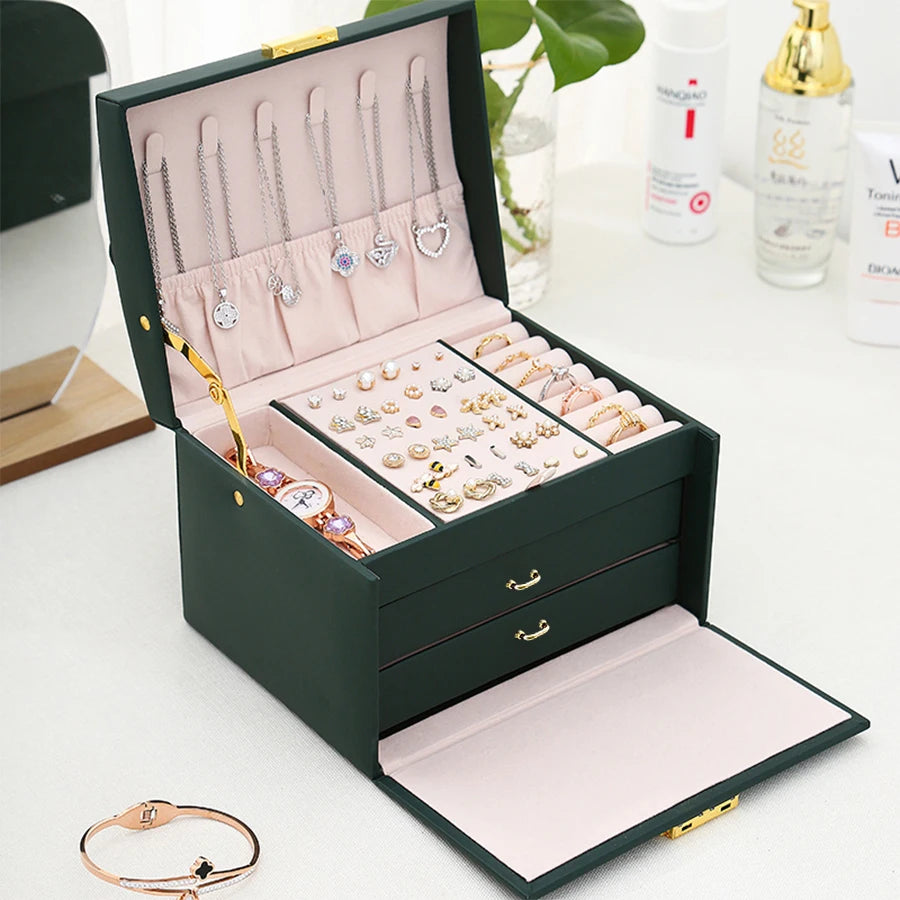 Boîte à bijoux à trois niveaux avec fermeture arquée