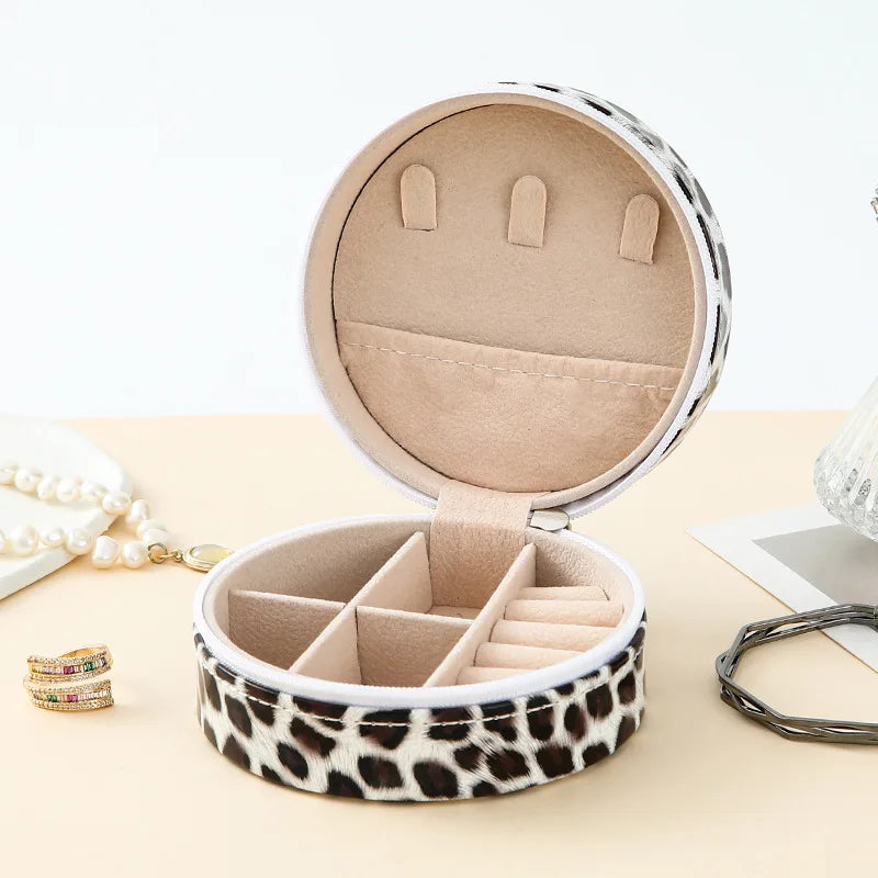 Boîte à bijoux de poche en cuir rigide