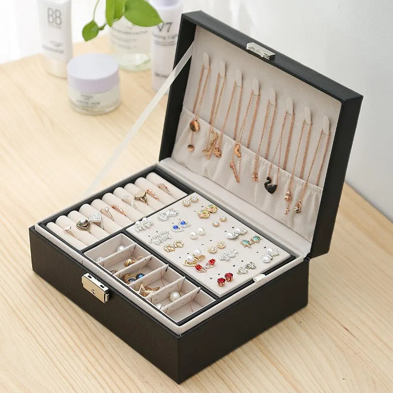 Boîte à bijoux chic en cuir et velours