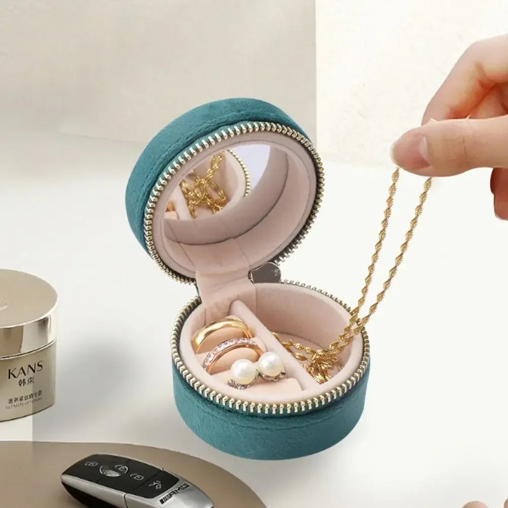 Boîte à bijoux ronde de poche en velours